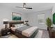 A virtually staged bedroom with large bed and window offering natural light at 1150 Collier Nw Rd # 6H, Atlanta, GA 30318