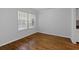 Bright bedroom featuring hardwood floors and a window at 1150 Collier Nw Rd # 6H, Atlanta, GA 30318