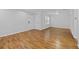 Large living room with hardwood flooring and natural light at 1150 Collier Nw Rd # 6H, Atlanta, GA 30318