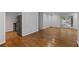 Spacious living area featuring hardwood floors and access to outdoor space at 1150 Collier Nw Rd # 6H, Atlanta, GA 30318