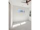 Bedroom featuring a ceiling fan and a bright window that brings in natural light at 1820 Lake Dow Rd, Mcdonough, GA 30252