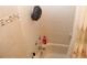 Bathroom shower with mosaic accent tile and shower caddy at 5574 Mccrossin Cir, Lithonia, GA 30038