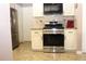 Modern kitchen equipped with stainless steel appliances, granite countertops and white cabinets for a sleek design at 5574 Mccrossin Cir, Lithonia, GA 30038