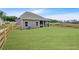 Spacious backyard featuring a lush green lawn and a traditional wooden fence at 18 Torry Pines Cir, Villa Rica, GA 30180
