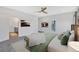 Main bedroom featuring an en-suite bathroom, with light filled windows and plush carpeting at 18 Torry Pines Cir, Villa Rica, GA 30180