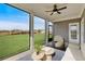 Inviting sunroom with cozy seating and picturesque backyard views at 18 Torry Pines Cir, Villa Rica, GA 30180