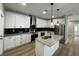 Modern kitchen with stainless steel appliances, granite countertops, and sleek white cabinetry at 3189 A Jackson, Hapeville, GA 30354
