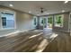 Bright room offers beautiful wood floors, recessed lights, and deck access through glass doors at 3189 A Jackson, Hapeville, GA 30354