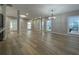 Spacious living room with hardwood floors, natural light, and modern lighting fixture at 3189 A Jackson, Hapeville, GA 30354