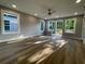 Light-filled room features beautiful wood floors, recessed lights, and access to a small deck at 3189 A Jackson, Hapeville, GA 30354