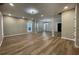 Expansive living room featuring contemporary flooring, neutral paint, recessed lights and an open concept design at 3189 A Jackson, Hapeville, GA 30354