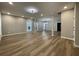 Expansive living room featuring contemporary flooring, neutral paint, recessed lights and an open concept design at 3189 A Jackson, Hapeville, GA 30354