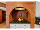 Close up of the kitchen cooktop situated within a brick alcove at 4820 Coppedge Trl, Duluth, GA 30096