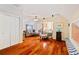 Spacious living room with hardwood floors, comfortable seating, and ample natural light at 4820 Coppedge Trl, Duluth, GA 30096