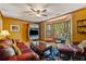 Cozy living room with hardwood floors, natural light, and comfortable seating for entertaining and relaxing at 4820 Coppedge Trl, Duluth, GA 30096