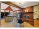 Open floor plan view of the kitchen and fireplace with seating area at 4820 Coppedge Trl, Duluth, GA 30096