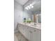 Bathroom features double sinks, large mirror and carpeted floors at 1203 Stratford Commons Commons, Decatur, GA 30030