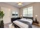 Bright bedroom features a large window, ceiling fan, and modern furnishings at 1203 Stratford Commons Commons, Decatur, GA 30030