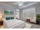 Virtually staged bedroom with a queen bed, white bedding, and plenty of natural light at 1203 Stratford Commons Commons, Decatur, GA 30030