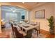 Dining area with modern table setting next to the living room at 1203 Stratford Commons Commons, Decatur, GA 30030
