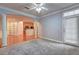 Spacious living room with hardwood floors and access to a balcony at 1203 Stratford Commons Commons, Decatur, GA 30030