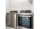 Laundry room with modern LG washer and dryer at 2560 Clairebrooke Bnd, Atlanta, GA 30341