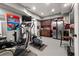 Basement gym area with exercise equipment and a kitchenette at 2921 Terra View Sw Dr, Lilburn, GA 30047