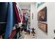 Organized walk-in closet with shelving and rods, providing ample storage space at 2921 Terra View Sw Dr, Lilburn, GA 30047