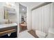 Bathroom with a modern sink and decor leading to a room with playful, colorful elements at 3252 Custer Lake Drive Northwest Nw Dr, Marietta, GA 30064