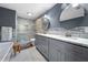 Beautiful bathroom featuring double vanity, granite countertop, and glass-enclosed shower at 3252 Custer Lake Drive Northwest Nw Dr, Marietta, GA 30064