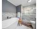 Elegant bathroom with a freestanding tub, walk-in shower, and modern fixtures at 3252 Custer Lake Drive Northwest Nw Dr, Marietta, GA 30064