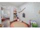 Hallway with a view into a charming bedroom featuring hardwood floors and playful decor at 3252 Custer Lake Drive Northwest Nw Dr, Marietta, GA 30064