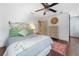 Bright bedroom with hardwood floors, ceiling fan, and stylish accents at 3252 Custer Lake Drive Northwest Nw Dr, Marietta, GA 30064