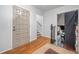 Neutral entryway with hardwood floors and access to the living room, staircase, and front door at 3252 Custer Lake Drive Northwest Nw Dr, Marietta, GA 30064