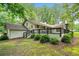 Charming ranch-style home with a black-railed deck, offering serene outdoor living space at 3252 Custer Lake Drive Northwest Nw Dr, Marietta, GA 30064