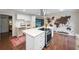 Open kitchen featuring stainless appliances, a center island with seating, and a unique world map wall decoration at 3252 Custer Lake Drive Northwest Nw Dr, Marietta, GA 30064
