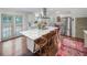 Spacious kitchen with a large marble island, stainless steel appliances, and bright natural light at 3252 Custer Lake Drive Northwest Nw Dr, Marietta, GA 30064
