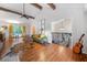 Bright living room with high ceilings, hardwood floors, exposed wood beams, and ample natural light at 3252 Custer Lake Drive Northwest Nw Dr, Marietta, GA 30064