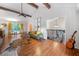 Spacious living room with high ceilings, hardwood floors, comfortable seating, and large windows, offering a bright and airy ambiance at 3252 Custer Lake Drive Northwest Nw Dr, Marietta, GA 30064