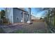 Fenced backyard with patio extending from the home at 1230 Chris Lake Dr, Lawrenceville, GA 30046