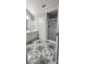 Bathroom with a tiled floor, a shower, and vanity with storage at 1230 Chris Lake Dr, Lawrenceville, GA 30046