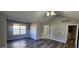 Large bedroom features vaulted ceiling, wood floors, neutral paint and a ceiling fan at 1230 Chris Lake Dr, Lawrenceville, GA 30046