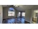 Bright bedroom with vaulted ceilings, modern floors, and large windows offer natural light at 1230 Chris Lake Dr, Lawrenceville, GA 30046