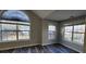 Bright bedroom with vaulted ceilings, modern floors, and large windows offer natural light at 1230 Chris Lake Dr, Lawrenceville, GA 30046