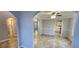 Open-concept dining area with archways and neutral color palette with tile floors at 1230 Chris Lake Dr, Lawrenceville, GA 30046