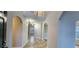 Spacious foyer featuring arched doorways and recessed lighting with a view to the stairway at 1230 Chris Lake Dr, Lawrenceville, GA 30046