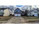 Charming two-story home featuring a two car garage and a well-maintained front yard at 1230 Chris Lake Dr, Lawrenceville, GA 30046