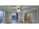 Bright dining room featuring arched doorways and trim work around the walls at 1230 Chris Lake Dr, Lawrenceville, GA 30046