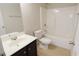 Bathroom features include a tiled floor, and a shower and bath tub combination at 315 Lakeside Ln, Woodstock, GA 30188