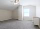 Spacious bedroom with vaulted ceiling, ceiling fan and a large window at 315 Lakeside Ln, Woodstock, GA 30188
